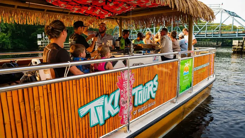 Family-friendly tiki boat cruise in Myrtle Beach with adults and kids enjoying a private ride on the Intracoastal Waterway